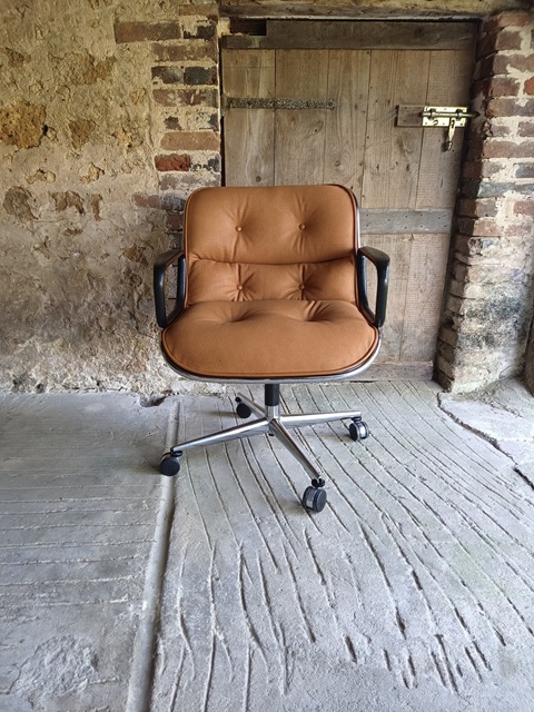 The back shell of the Pollock chair covered in leather